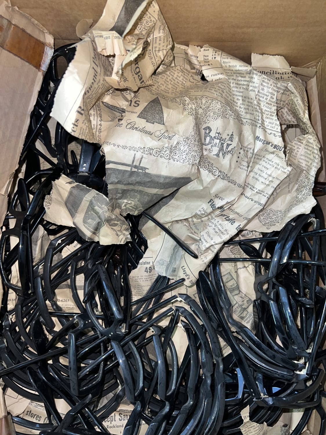 A box full of raw Telesol frames by Fidela, from Oyonnax.